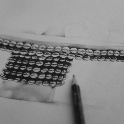 Lustra Dining Table by Hekla Property – sculptural design with Macassar ebony top and polished brass sphere base.